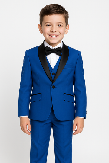 Young boy wearing a blue suit with a black bow tie