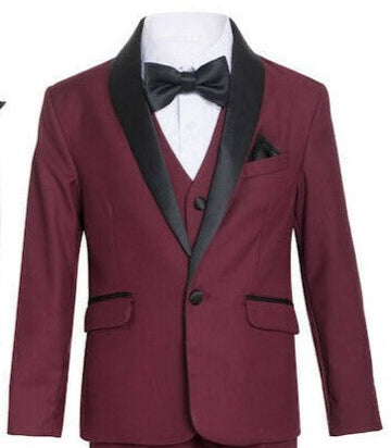 The burgundy shawl tuxedo suit, a symbol of richness and elegance for a boy.