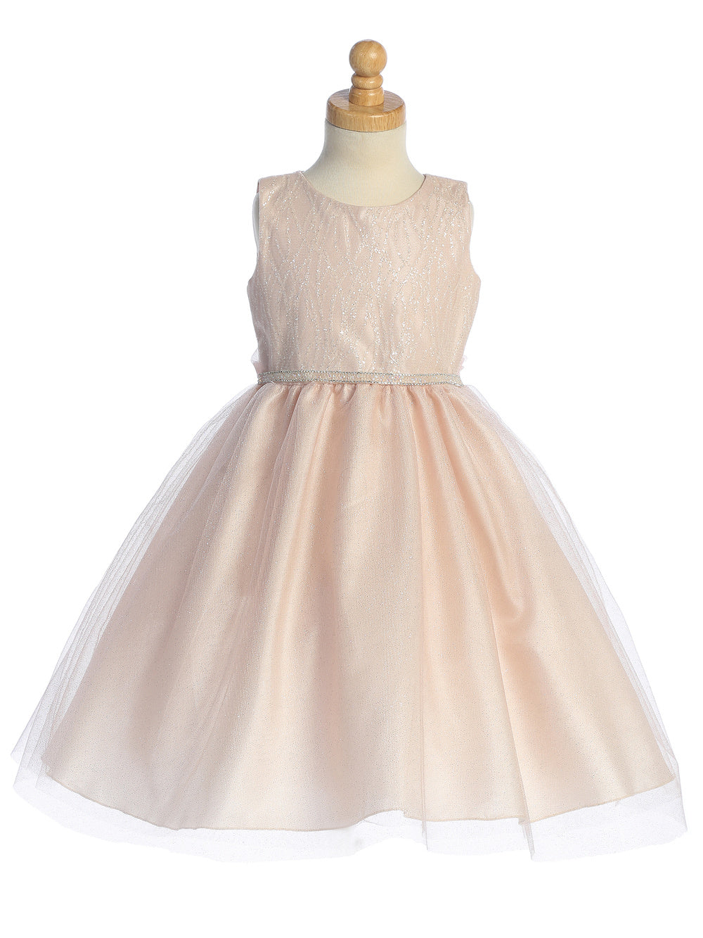 Childhood innocence captured in a handcrafted U.S.A. made tulle dress.