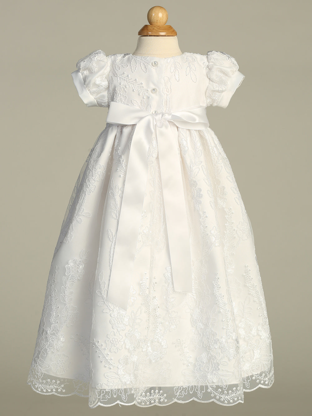Back view of Girls White Baptism Gown - Grace featuring satin bow, button closure, and floral embroidery, perfect for traditional baby baptisms.