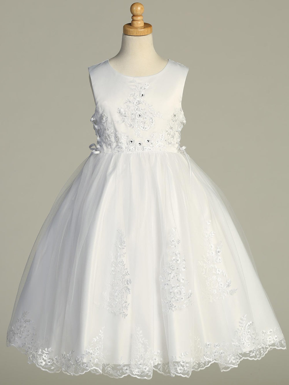 Girls White First Communion Dress SP728 on mannequin, featuring embroidered satin bodice, tulle skirt, sequins, beads, and rhinestones.