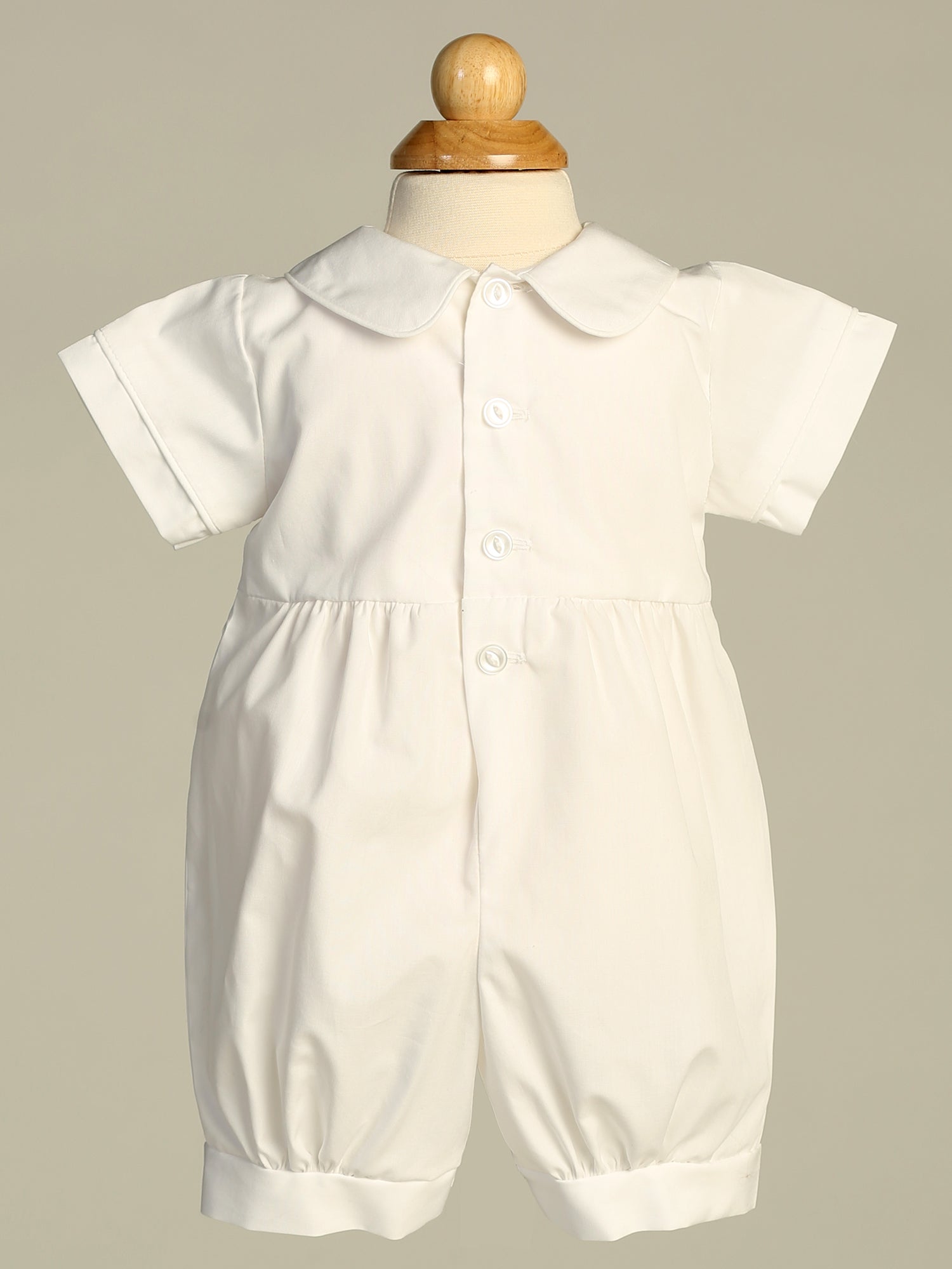 Samuel cotton romper - a gentle embrace for a baby boy's baptism.