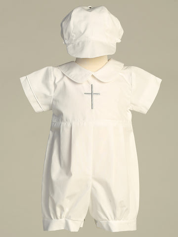 Christening day, baby boy adorned in the Samuel white cotton romper.