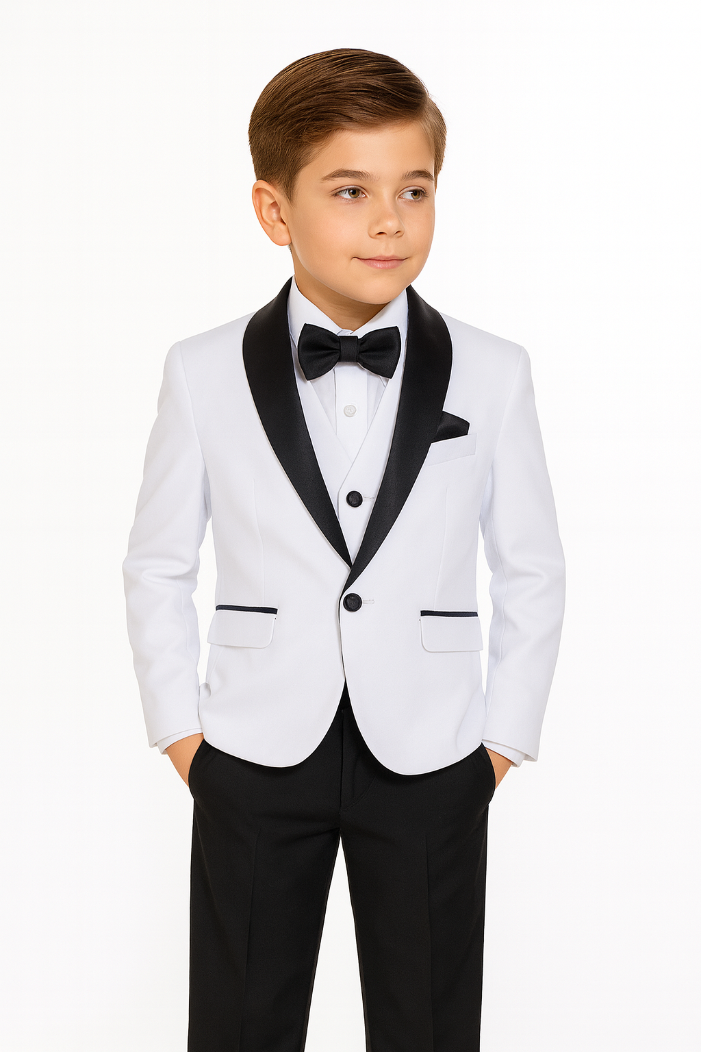 Young boy wearing a white tuxedo with black lapels and bow tie