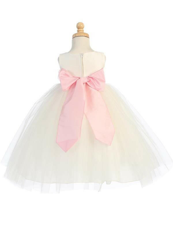 Back view of Silver Flower Girl Dress with customizable pink sash bow, ideal for weddings and special occasions by Malcolm Royce.