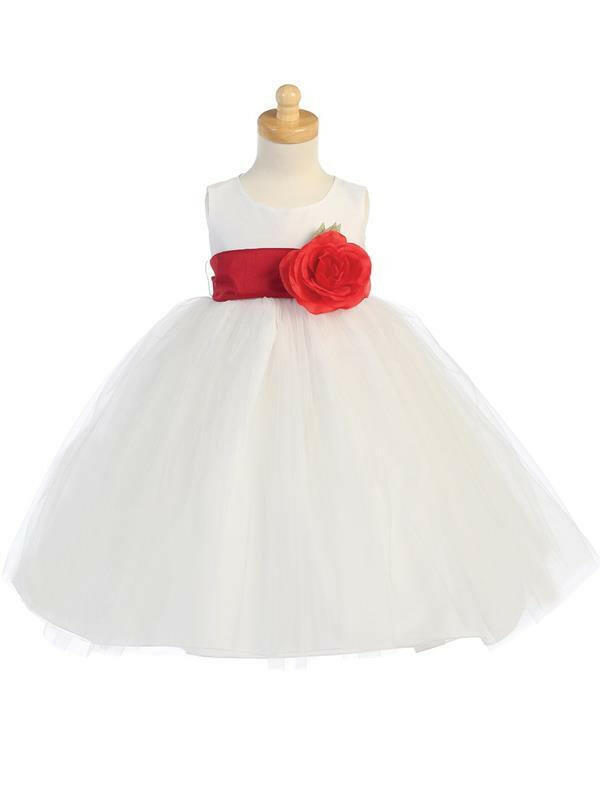 Elegant White Flower Girl Dress by Malcolm Royce with full tulle skirt and red detachable sash and flower, ideal for weddings and special events.