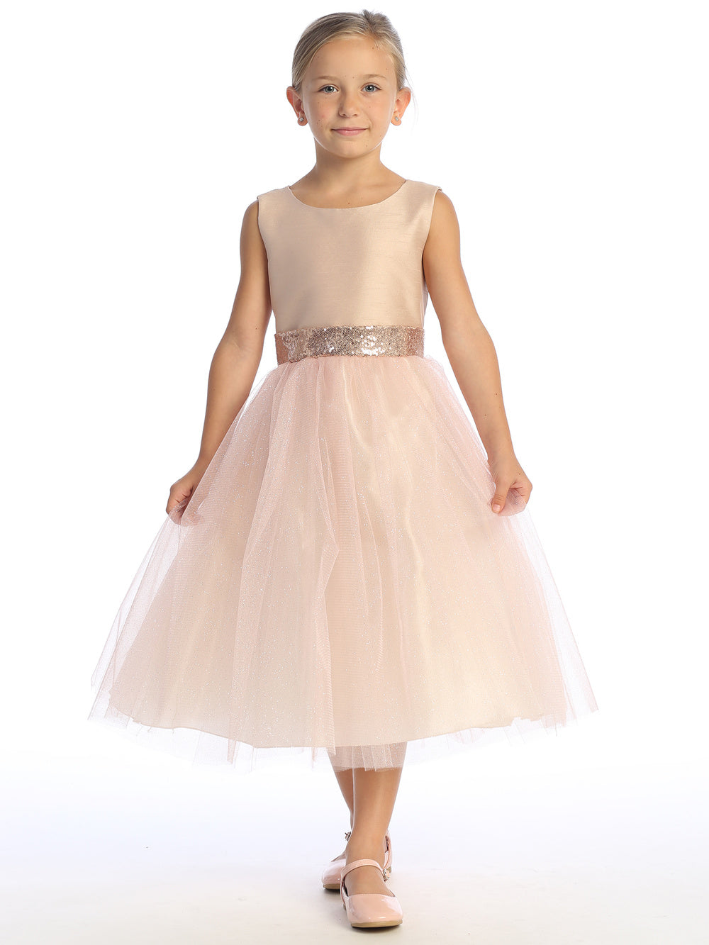Flower girl glows in blush shantung dress, sequins shimmering in the tulle.