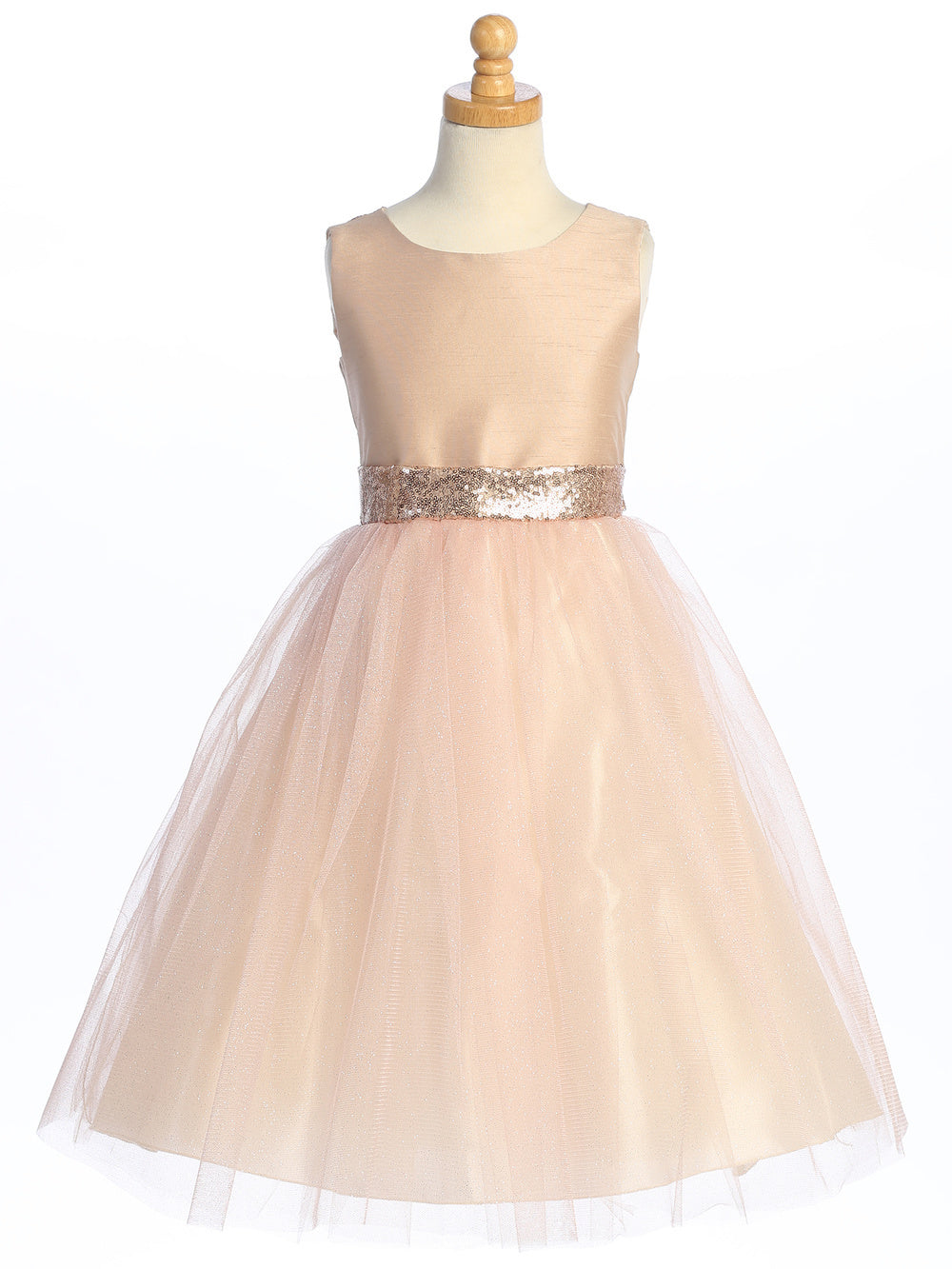 Flower girl captivates in a sequined blush shantung dress with sparkling tulle.