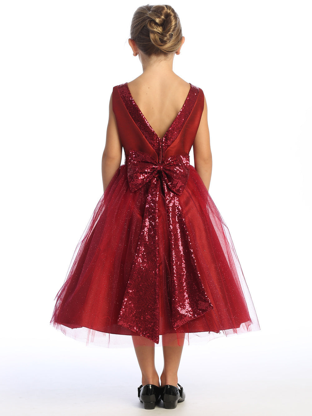 Rich burgundy shantung dress twinkles with sequins on a radiant flower girl.