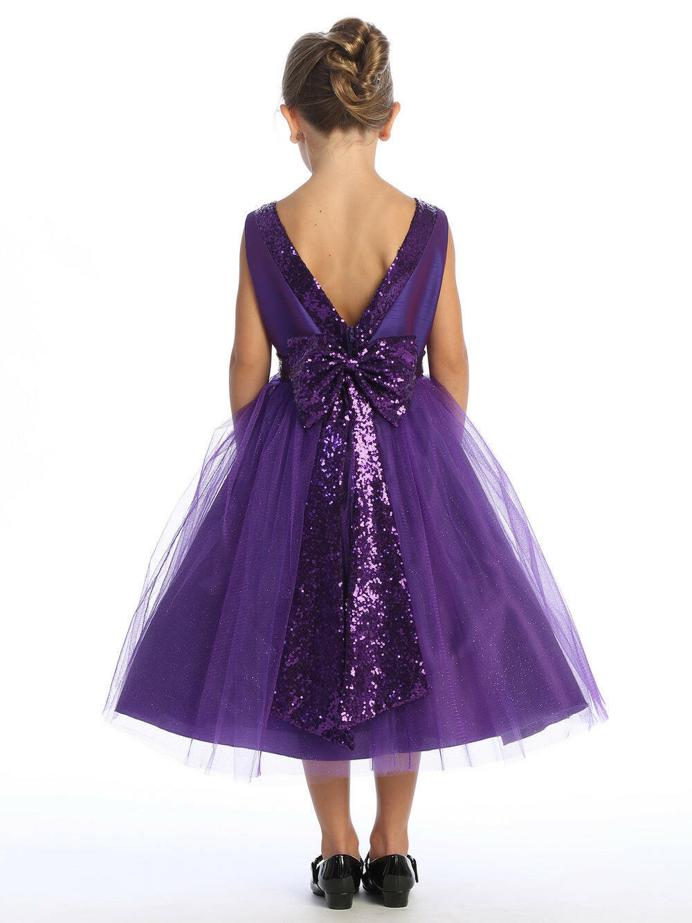 Back view of Elegant Purple Flower Girl Dress showing deep V-back, large sequin bow, and sparkle tulle overlay, perfect for weddings or special events.