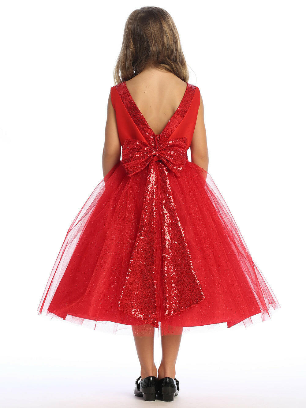 Back view of red flower girl dress with deep V-back and oversized sequin bow. Sparkle tulle overlay adds elegance to this tea-length bridal party dress.