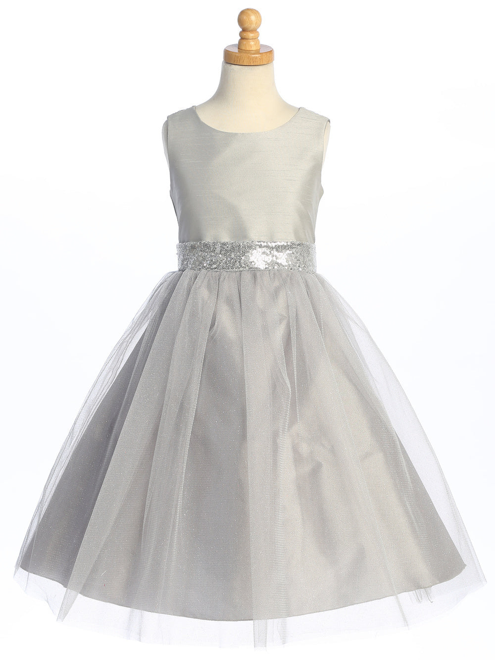Flower girl shines in a sequined silver shantung dress with glimmering tulle.