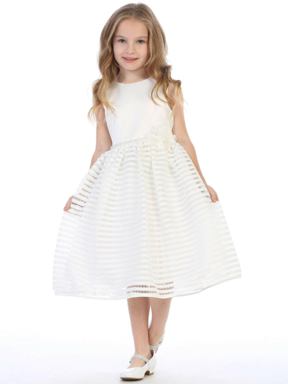 Ivory satin flower girl dress with sleeveless bodice and striped netting tea-length skirt by Malcolm Royce, ideal for weddings.