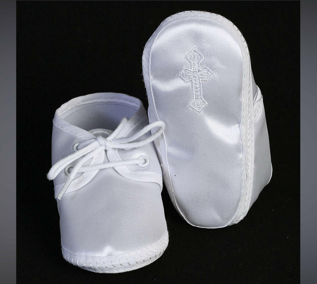 White satin boy's Baptism Bootie with embroidered cross on sole and lace-up front, ideal accessory for christening outfits.