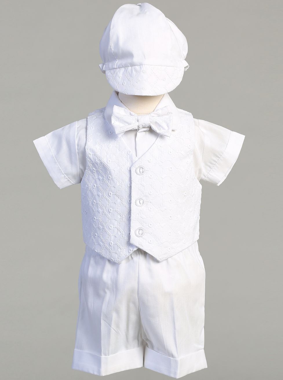 Baby boy glowing in Diego/Corey white christening ensemble.