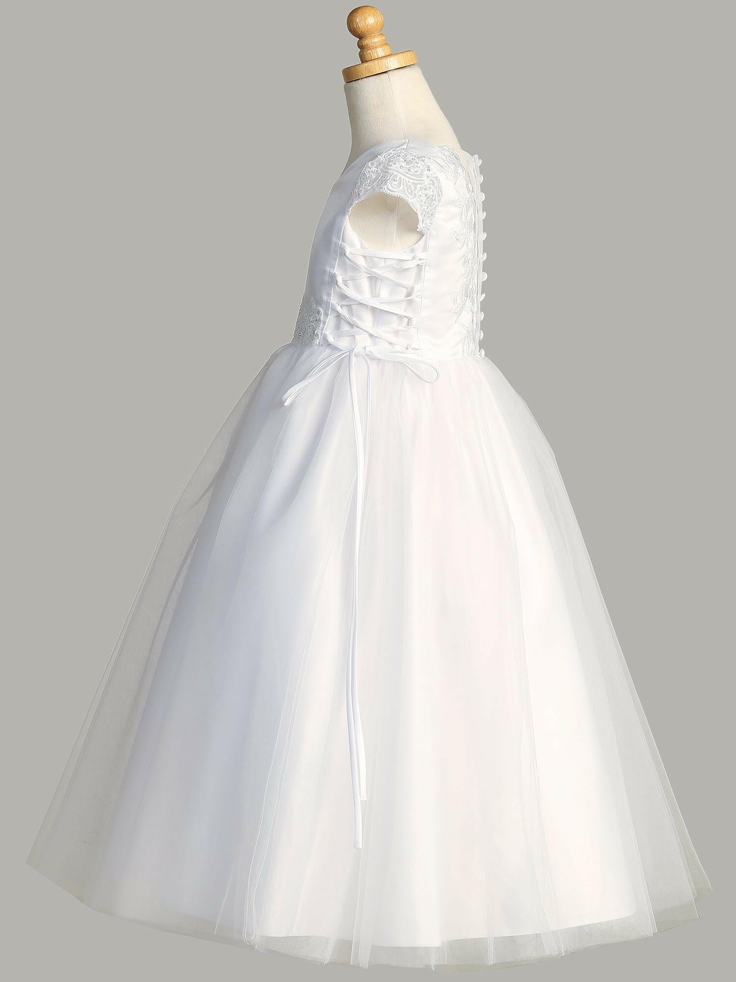 Close-up view of the satin bodice with lace cap sleeves, showcasing the delicate lace details.
