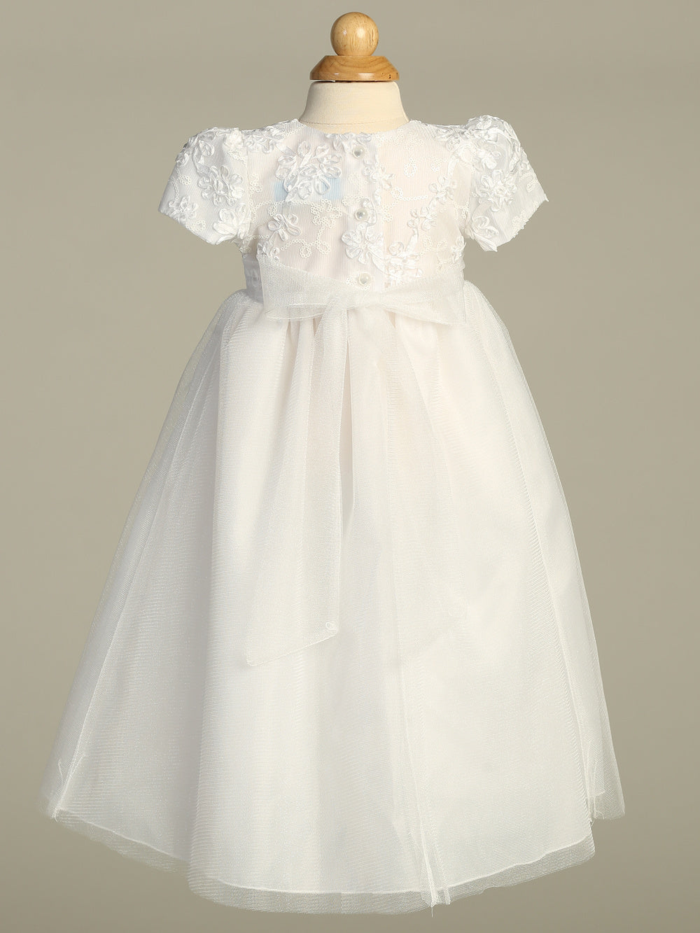 Timeless Grace Lillian Baptism Gown for girls featuring embroidered lace top, tulle overlay skirt, and satin ribbon waist. Perfect for 0-18 months.