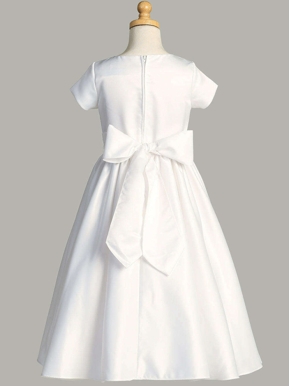 Close-up view of the silver corded trim on the waist of the First Communion Dress.