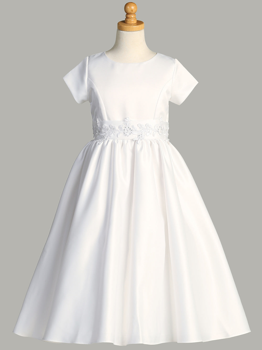 Back view of the First Communion Dress showing the zip fastening and satin tie.