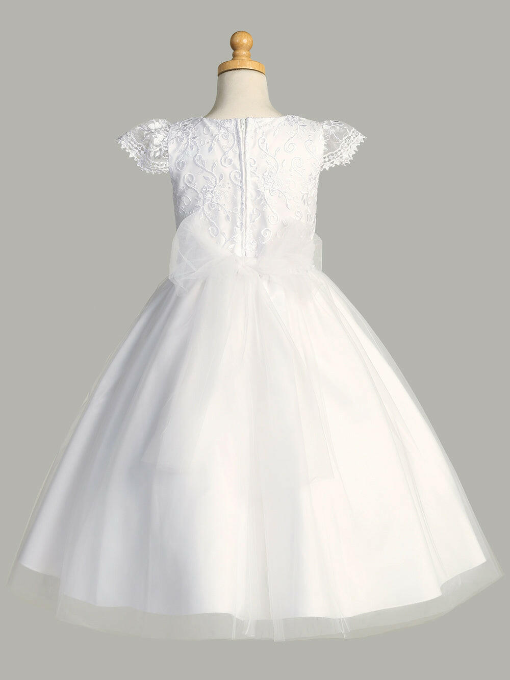 Back view of Malcolm Royce First Communion dress with embroidered tulle bodice and large tulle bow, ideal for traditional girls' ceremonies.