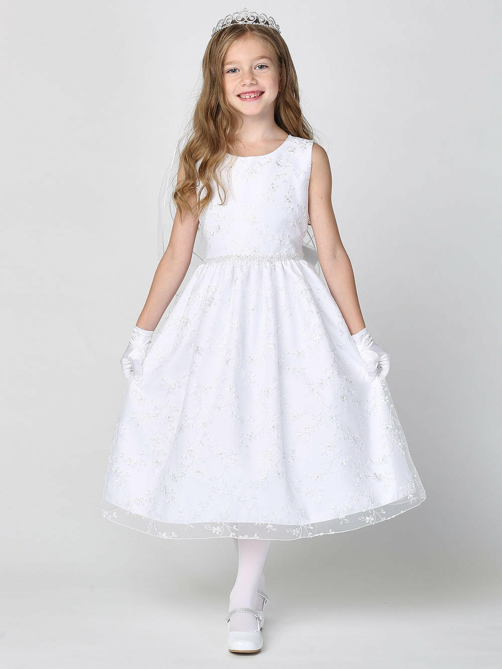 Girls' First Communion Dress with tulle and sequins by Malcolm Royce, featuring sleeveless bodice and tea-length embroidered skirt.