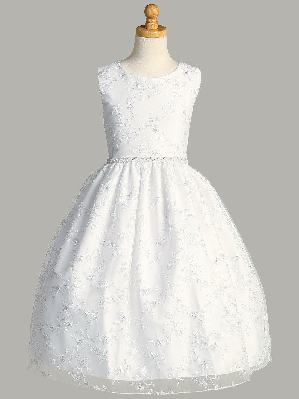 Front view of Girls' White First Communion Dress by Malcolm Royce, featuring floral embroidered tulle overlay and sequin embellishments.
