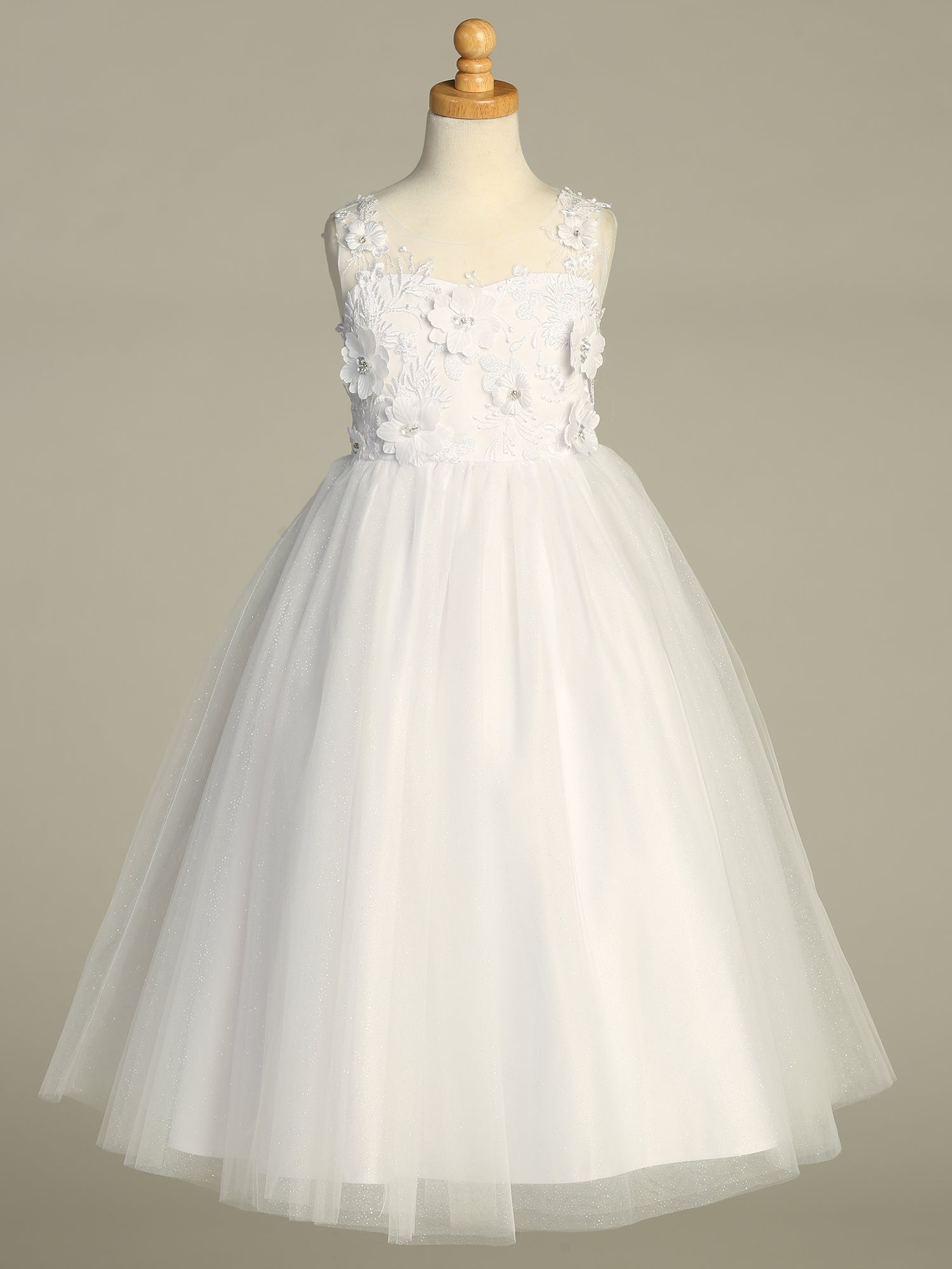 Back view of the First Communion Dress showing the zipper and tie-back tulle sash closure.