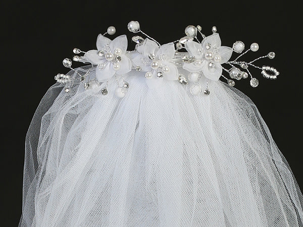 24" Communion veil with organza flowers, pearls, and rhinestones on a white headpiece. Ideal for girls' religious ceremonies and special occasions.