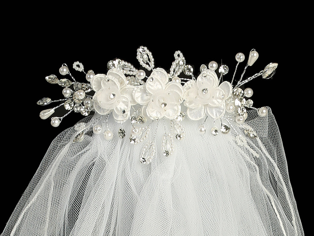 24" Communion Veil with Organza Corded Flowers & Rhinestones featuring a comb base adorned with pearl and crystal floral accents.
