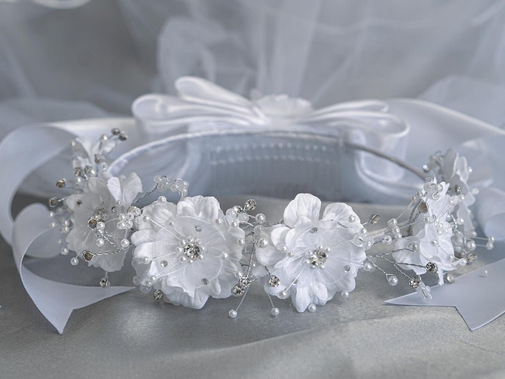 24" Communion Veil with silk organza flowers, pearls, and rhinestones on a comb. Features satin bows for a delicate, elegant ceremonial look.