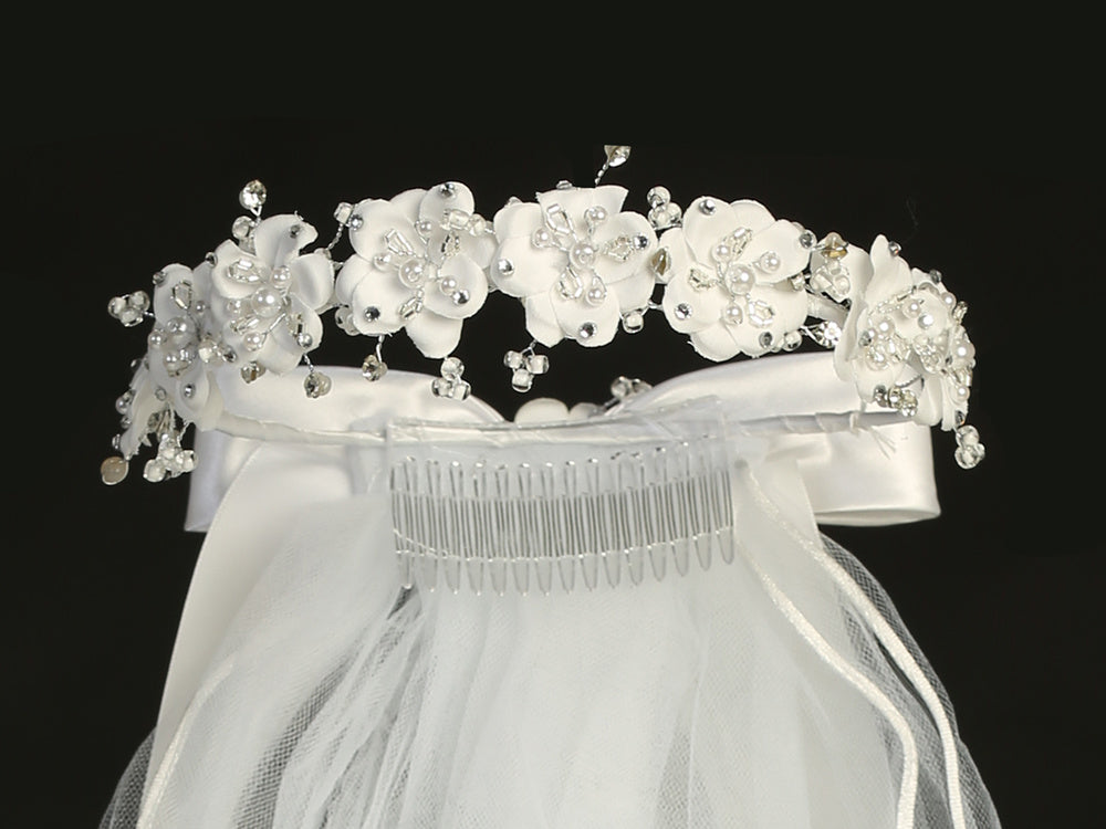 Communion veil with pearls & rhinestones in 24" length, adorned with satin floral accents and crystal embellishments, perfect for ceremonial occasions.
