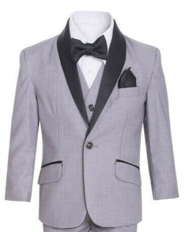 A boy personifies elegance in the versatile grey shawl tuxedo suit.
