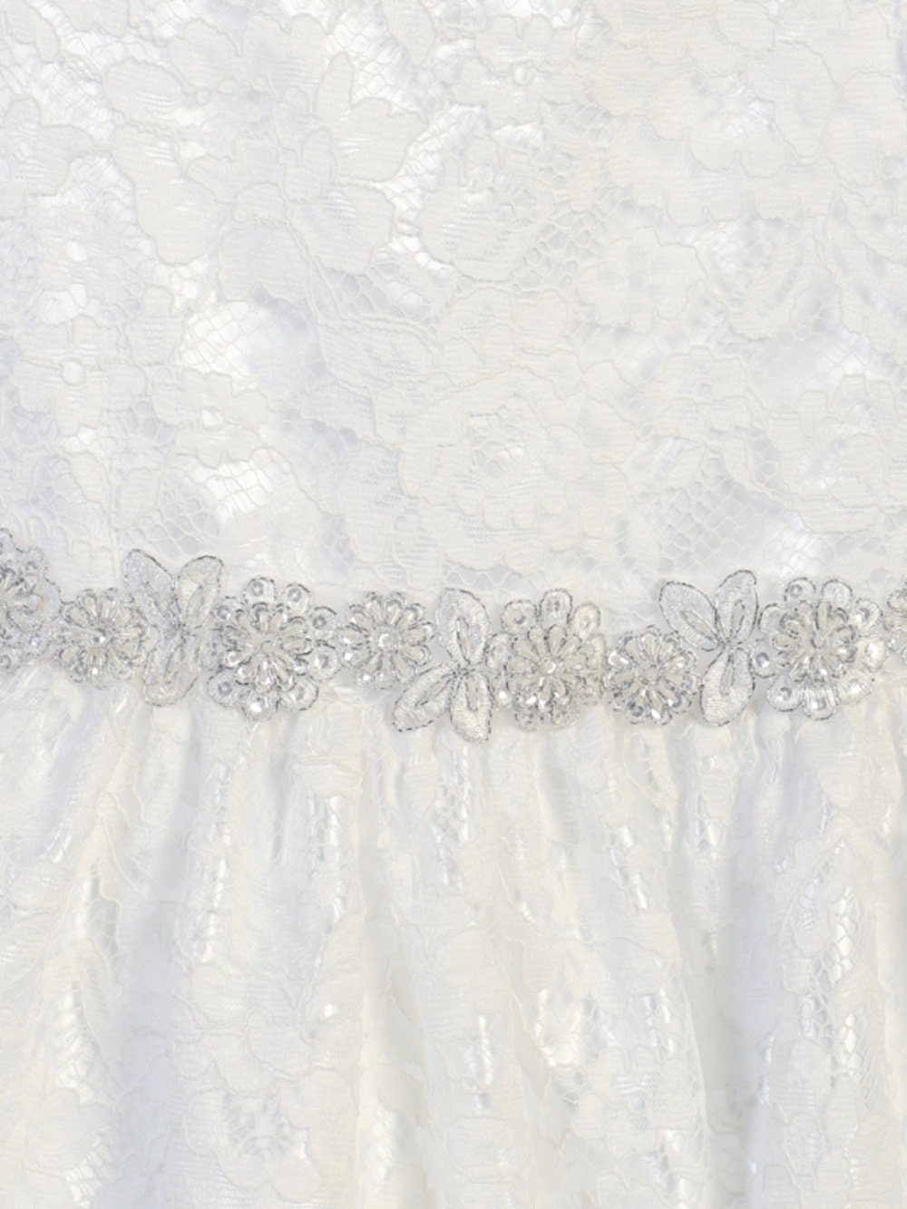 Close-up view of the lace fabric, showcasing the delicate lace details.