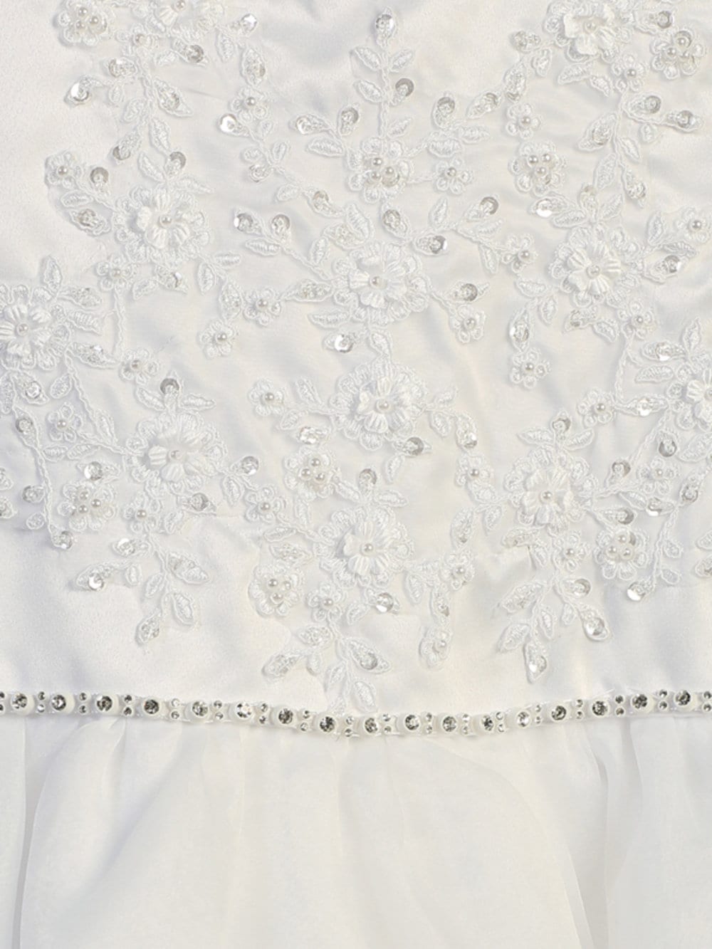 A view of the rhinestone trim on the waist and the three layers of the organza skirt.