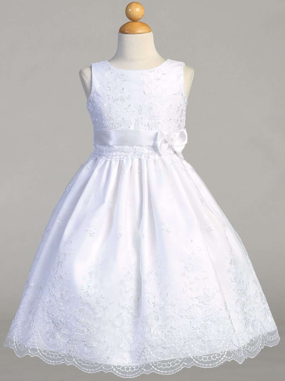 Close-up view of the embroidered organza fabric, showcasing the delicate embroidery details.