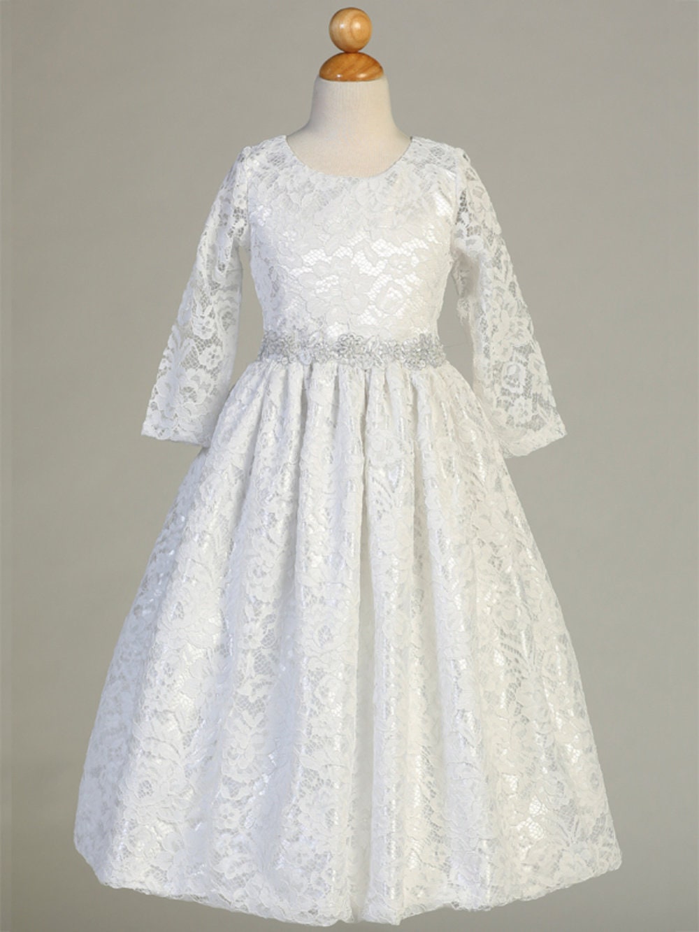 A view of the dress's tea-length hemline.