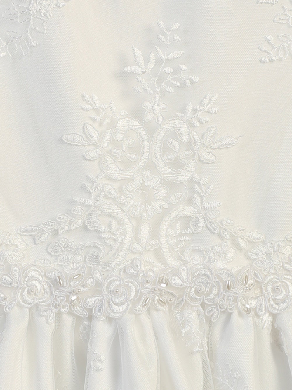 A view of the dress's tea-length hemline.