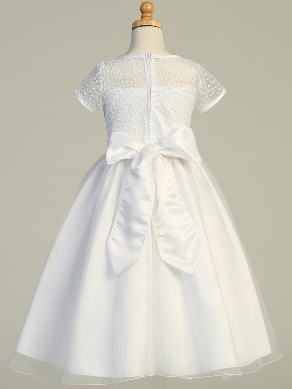 A view of the organza skirt with a tea-length hemline.