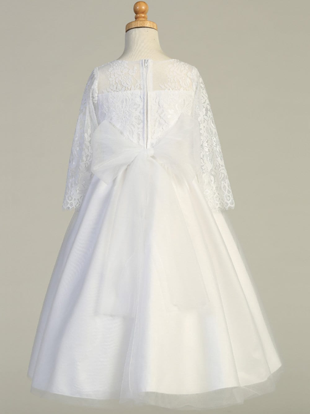 A view of the dress's tea-length hemline.