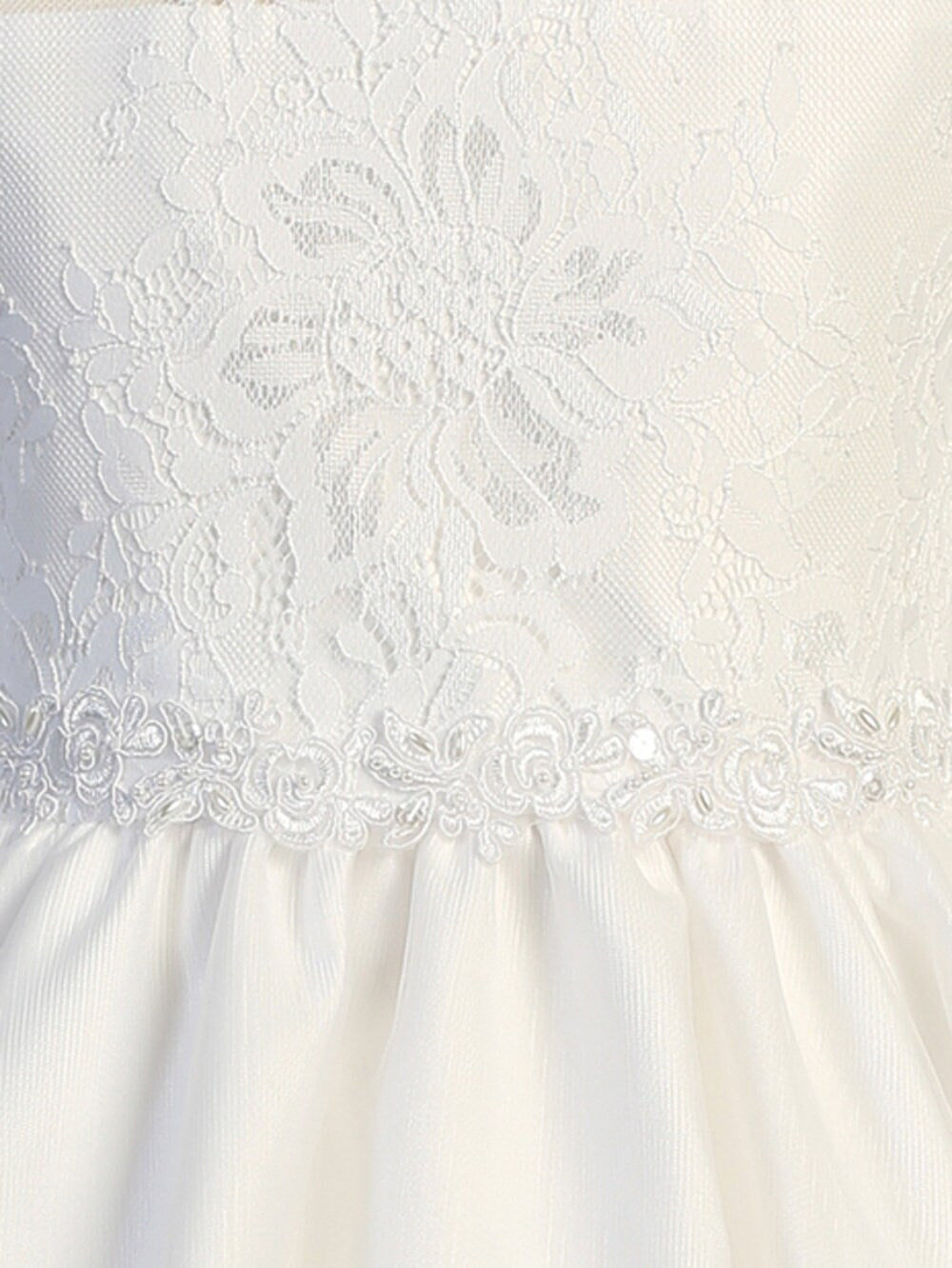 Close-up view of the lace fabric, showcasing the delicate lace details.