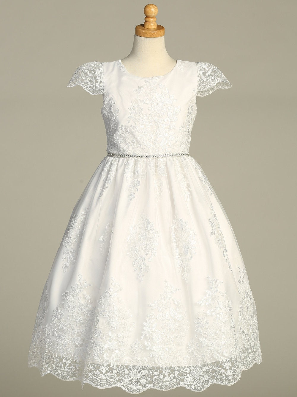 Back view of the First Communion Dress showing the zip fastening and bow tie.