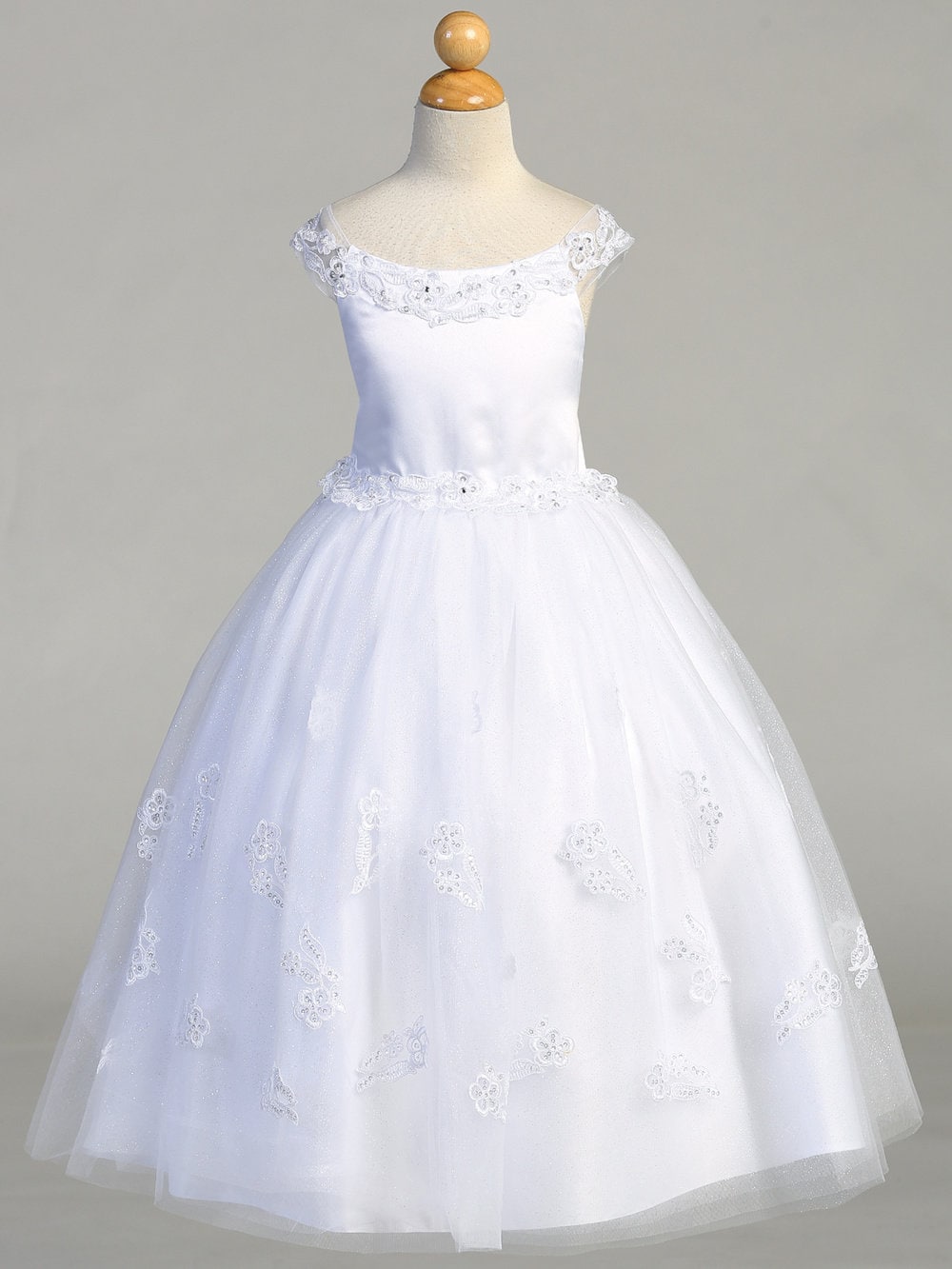 Back view of the First Communion Dress showing the zip fastening and bow tie.