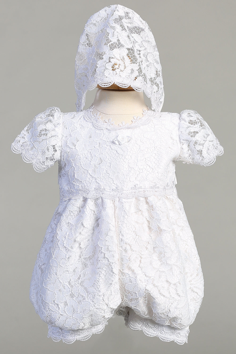 Hazel White Romper for girls with lace overlay and matching bonnet, ideal for christening and baptism ceremonies. Available with free US shipping.